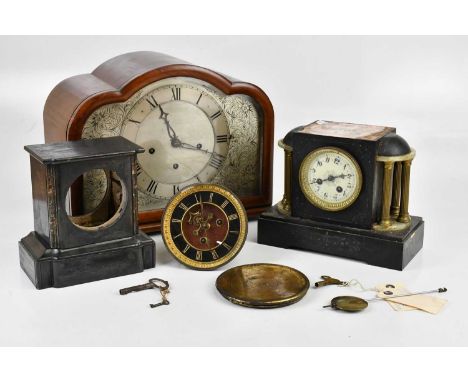 An early 20th century mahogany cased mantel clock of unusual proportions, the silvered face set with chased floral decoration