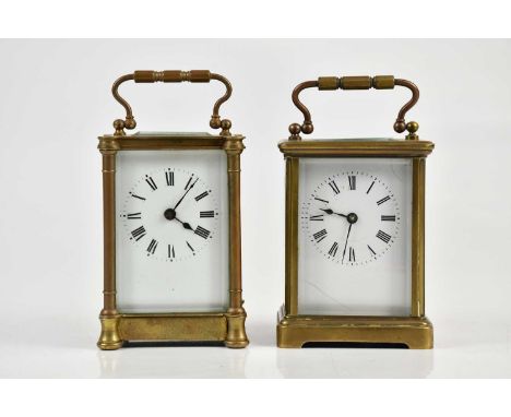 A late 19th century French brass cased carriage clock with swing handle, the enamel dial set with Roman numerals, height 14cm