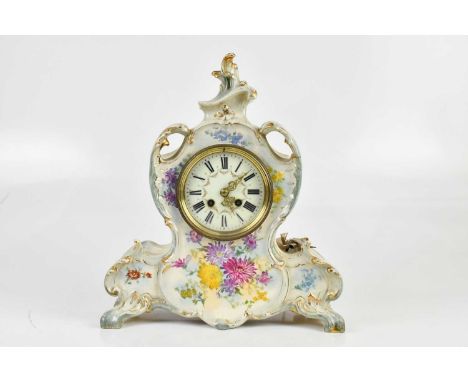 ROYAL BONN; a late Victorian ceramic mantel clock with transfer printed floral decoration, the dial set with Roman numerals, 