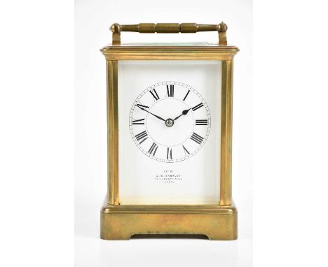 A late 19th century brass cased carriage clock, the enamel dial set with Roman numerals, signed 'J B Yabsley, Ludgate Hill, L