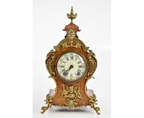 LENZKIRCH; an early 20th century walnut mantel clock with gilt metal applied urn, mask head and scrolling detail, the dial se