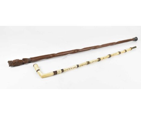 A resin and bone walking stick, inscribed 'RE' and 'Sapper Able France 1917 1918', with bullet casing to the bottom and an ar