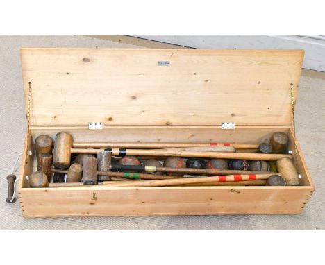 A vintage croquet set within pine Bazar Lausannois case.