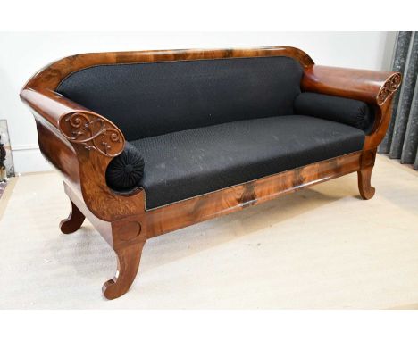 A Biedermeier style carved flame mahogany sofa, upholstered in a blue material, length 190cm.