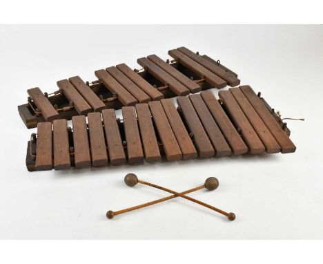 A vintage cased wooden xylophone, stamped 'English G.P.M. Made'. 