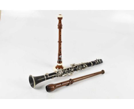 J R LAFLEUR &amp; SONS, a clarinet, together with two further woodwind instruments.
