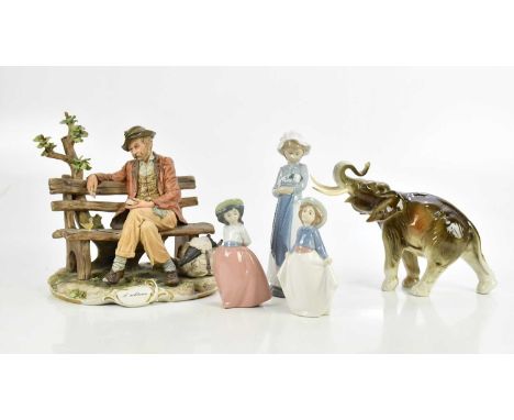 A small group of ceramic figures comprising a Royal Dux elephant, three Nao figures and a Capodimonte figure, 'Il Solitario',