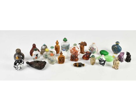 A collection of Chinese porcelain, glass, hardstones and other snuff bottles including a cloisonné example, also a hardstone 