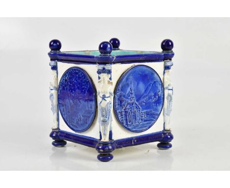 WEDGWOOD; a Victorian majolica planter of square form, with four applied circular roundels decorated with landscape scenes an