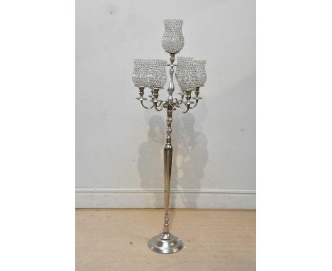 A 20th century steel six branch standard lamp, height 182cm.   Condition Report: The item or items in this lot are sold as de
