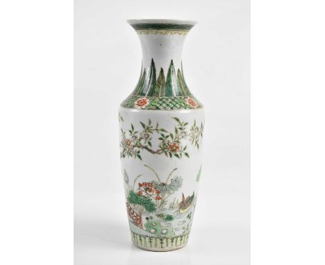 A 19th century Chinese Famille Verte vase with flared rim, decorated with butterflies, ducks and floral sprays, with Kangxi d