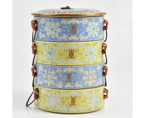 A 20th century Chinese Famille Rose four section stacking bowls / boxes, twith two blue ground sections and two yellow ground