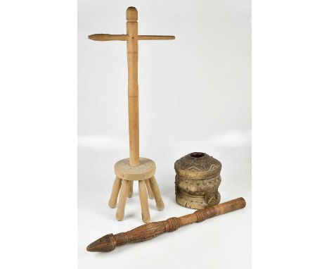 A pine wash dolly, height 92cm, with an Indian carved wood coffee grinder and a vintage scythe, (3).