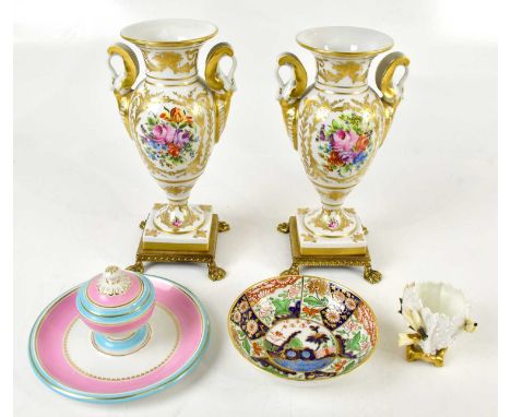 A pair of hand painted twin handled pedestal urn vases on gilt metal bases, height 25cm, a Victorian ceramic inkwell, a Derby