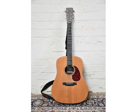 MARTIN &amp; CO; a DX1R dreadnought solid spruce top six string acoustic guitar, serial number 974093, together with Stagg ha
