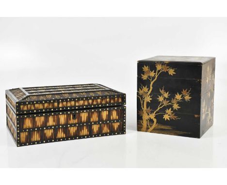 A bone inlaid porcupine quill box, the hinged cover decorated with two elephants flanking a crucifix, with detachable tray wi