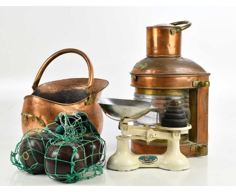 A copper ship's lamp, height 48cm, a copper coal bucket, a vintage set of scales and a set of bowling balls (4).