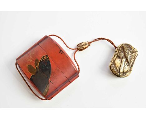 A Japanese Meiji period red lacquered three section inro decorated with a carp, with attached carved ojime and bone netsuke c