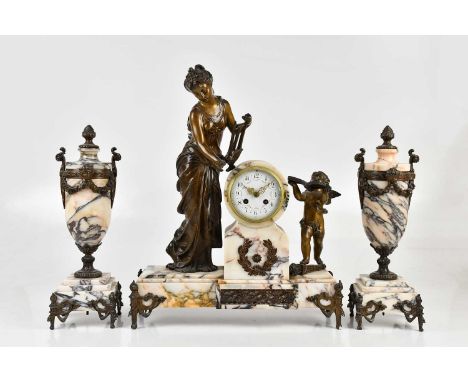 A late 19th century French marble and bronzed spelter three piece clock garniture, the clock with drum enamel face set with A