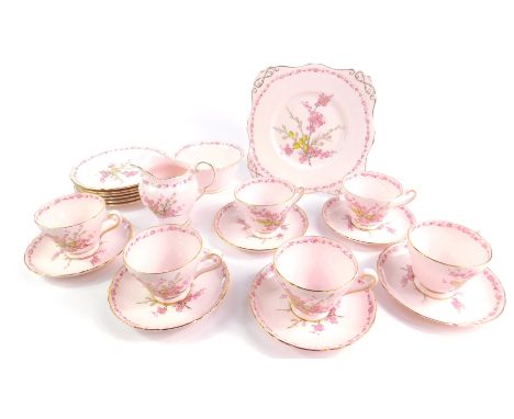 A Tuscan bone china part tea service decorated in the April Beauty pattern, comprising bread plate, cream jug, sugar bowl, si