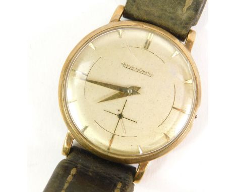 A Jaeger-LeCoultre gentleman's 9ct gold circular cased wristwatch, silvered dial with gold batons, subsidiary seconds dial, m