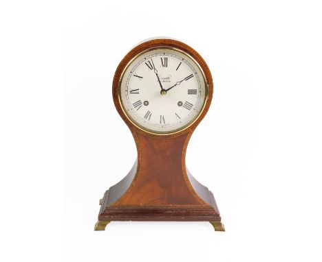 A Comitti of London mahogany and satinwood crossbanded balloon mantel clock, circular dial bearing Roman numerals, eight day 