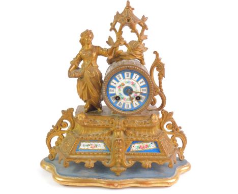 A French late 19thC gilt metal mantel clock, the circular porcelain dial painted with flowers and Roman numerals, eight day F