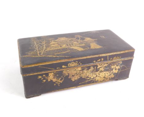 A Japanese Meiji / Taisho shakudo box, of rectangular form, decorated to the lid with houses and Mount Fuji, to the sides wit