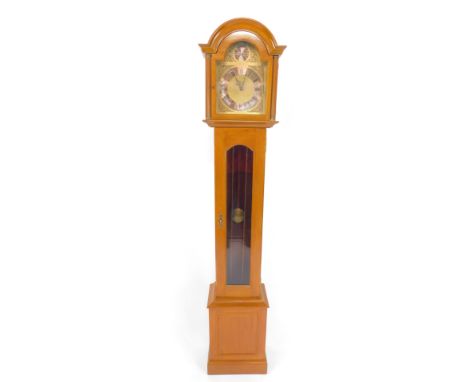 A light stained mahogany grandmother clock, the brass break arch dial with silvered chapter ring bearing Roman numerals, two 