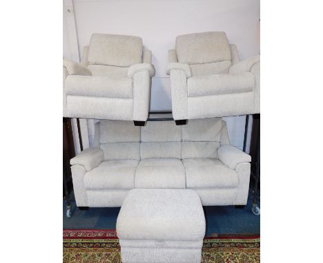 A Parker Knoll four piece suite, upholstered in cream fabric, comprising three seater sofa 190cm W, pair of armchairs, and an