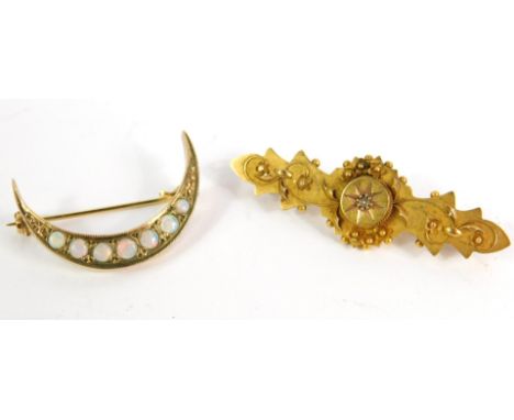 A 9ct gold and opal set crescent moon brooch, 2.9g, together with a Victorian 15ct gold diamond set brooch, 2.7g.