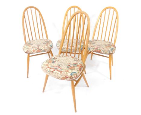 A set of four Ercol Windsor Quaker ash kitchen chairs, with cushioned seats raised on turned legs united by an H framed stret