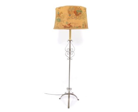 A cast steel standard lamp, with faux candle top, and an octagonal fabric shade printed with cartoon hunting scenes, 180cm hi