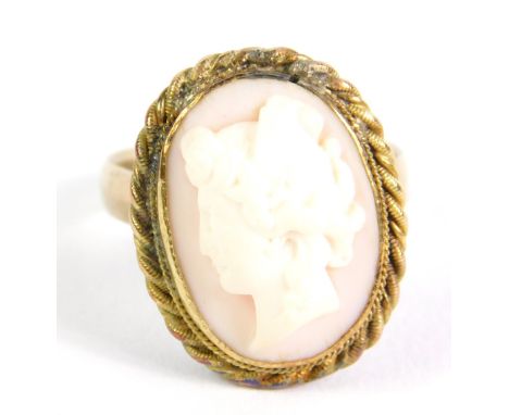 A 9ct gold and cameo ring, bust portrait of a lady against a pink ground, size Q, 6g.