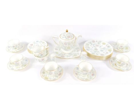 A Minton porcelain breakfast service decorated in the Vanessa pattern, comprising teapot, cream jug, sugar bowl, bread plate,