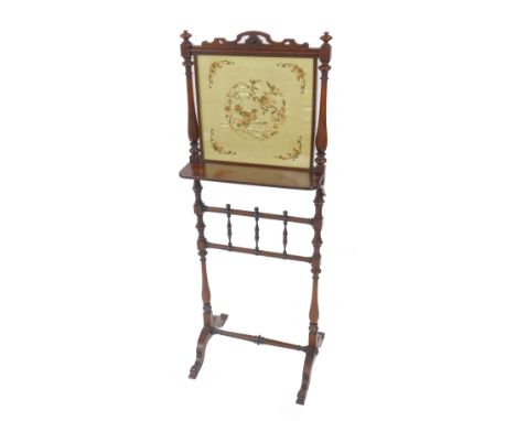 A late Regency rosewood fire screen, the square screen fronting a drop down shelf raised on baluster turned supports, united 