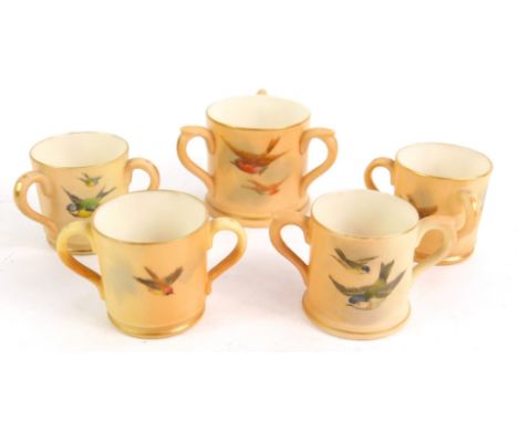 A Royal Worcester blush porcelain tyg, c1912, decorated with birds, two similar Grainger &amp; Co Worcester tygs, a Royal Wor