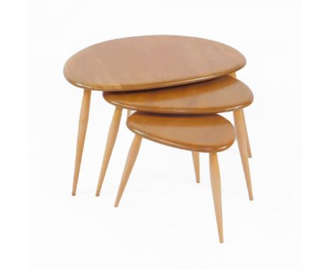 A 1960's Ercol kidney or pebble shaped teak nest of occasional tables, 40cm H, 65cm W, 43.5cm D.