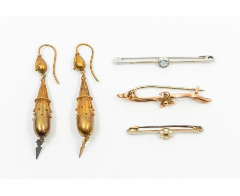 A pair of Victorian gold drop earrings, comprising a pear shaped top suspending an elongated pearl shaped dropper overlaid wi