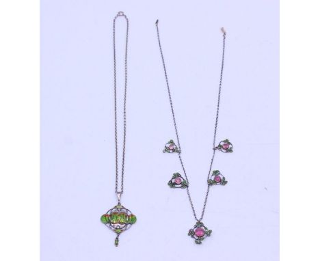 Two silver and enamel Art Nouveau necklaces, to include a green enamel dropper pendant and chain, marked LIBERTY, pendant len