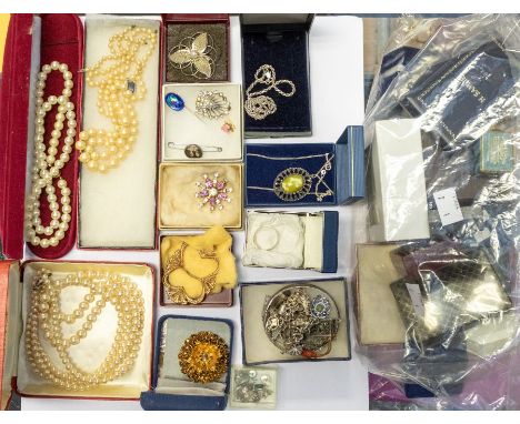 A collection of costume jewellery to include silver chains, pendants, cameo brooch pendant, cross, earrings, silver and 9ct g