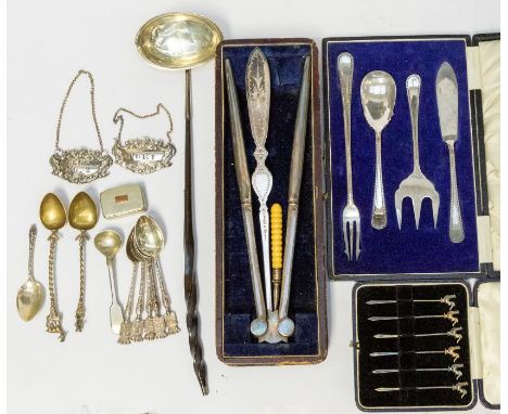 A 19th Century white meal oval punch ladle with balon twist handle, untested and unmarked together with a collection of plate