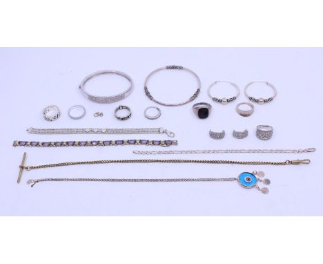 A collection of silver jewellery to include a diamond set bangle with pierced decoration, with matching ring, size L and  ear