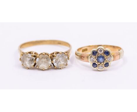 A sapphire and diamond set cluster ring with three colour shank, size L, along with a 9ct gold and quartz set three stone rin