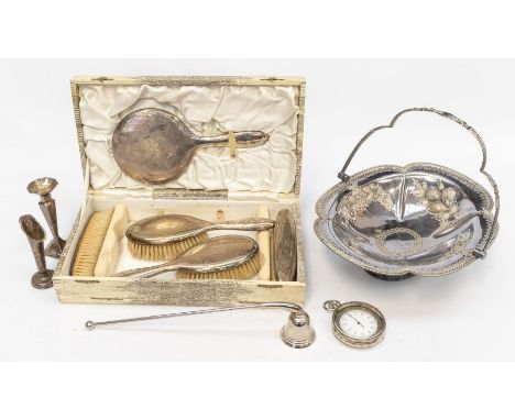 A matched George V plain silver mounted dressing table set comprising mirror, two hair and two clothes brushes, hallmarked by