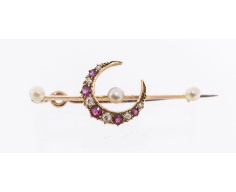 A Victorian ruby, diamond and pearl set crescent bar brooch, comprising a crescent set with alternate round cut rubies and ol