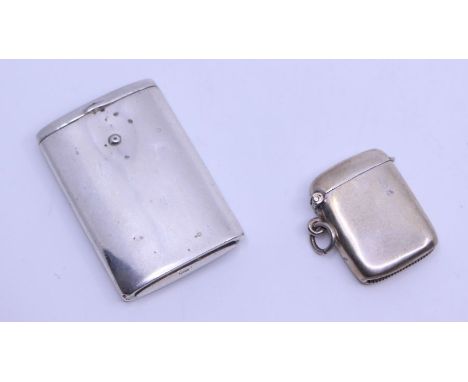 A George V plain silver oblong match holder, button clasp, hallmarked by Lindsay &amp; Paisley, Birmingham, 1925 together wit