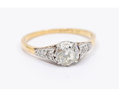 An early 20th century diamond and 18ct gold ring, comprising a claw set old cut diamond approx 0.73ct, assessed colour J/K, a