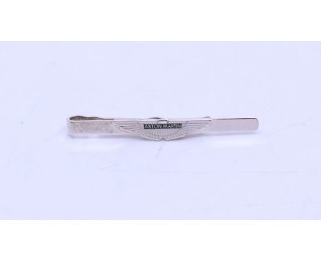 Aston Martin Interest- a silver and enamel tie clip featuring the Aston Martin winged motif, length approx 52mm, hallmarked F