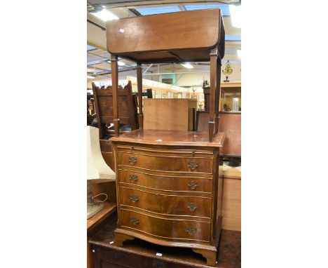 Reproduction mahogany Vanity Chest of serpentine drawers consisting of four drawers and a vanity shelf, together with a repro